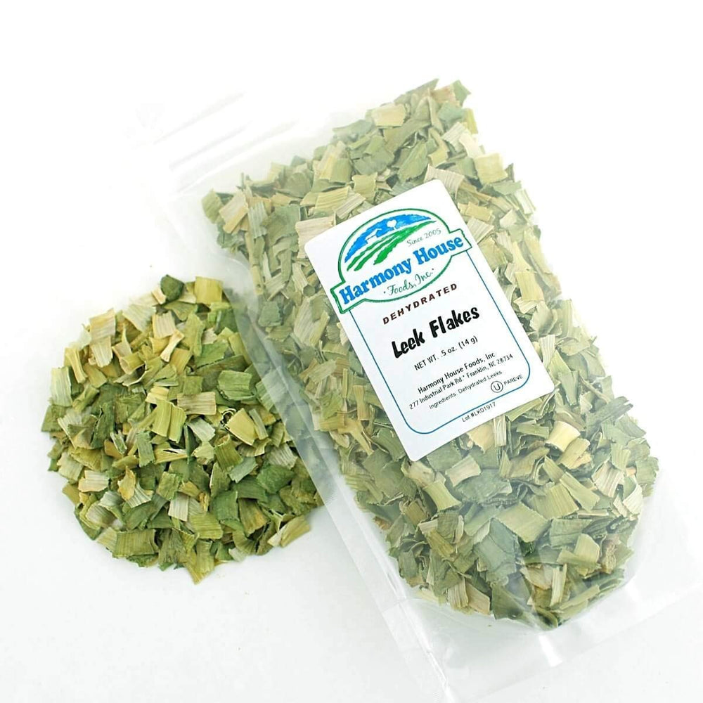Harmony House leek flakes measured with a scoop for precise seasoning.