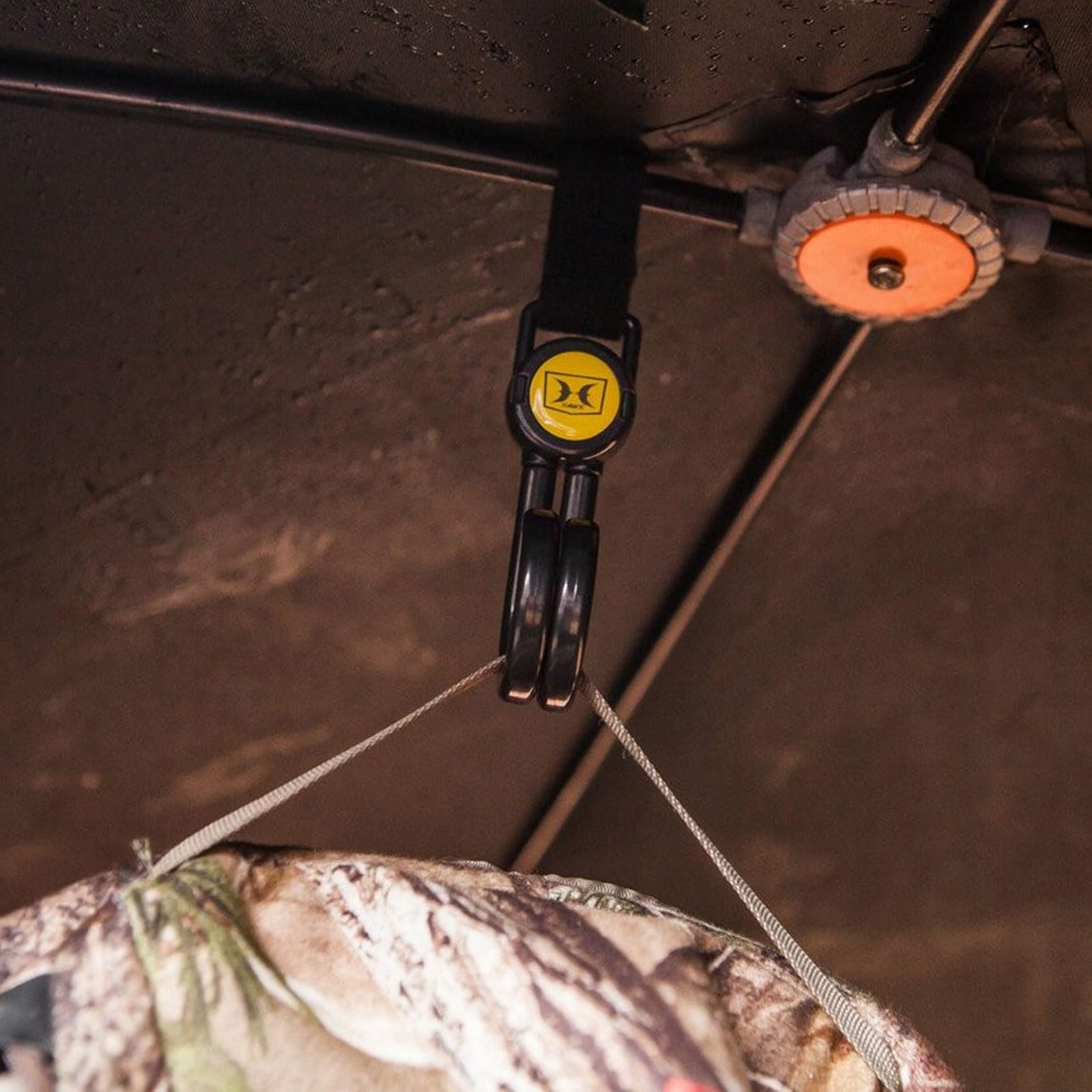 Hawk Claw hangs easily from a backpack for fast access.