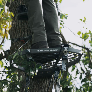 Hawk Helium XL backpack straps for hands-free carry between stands.