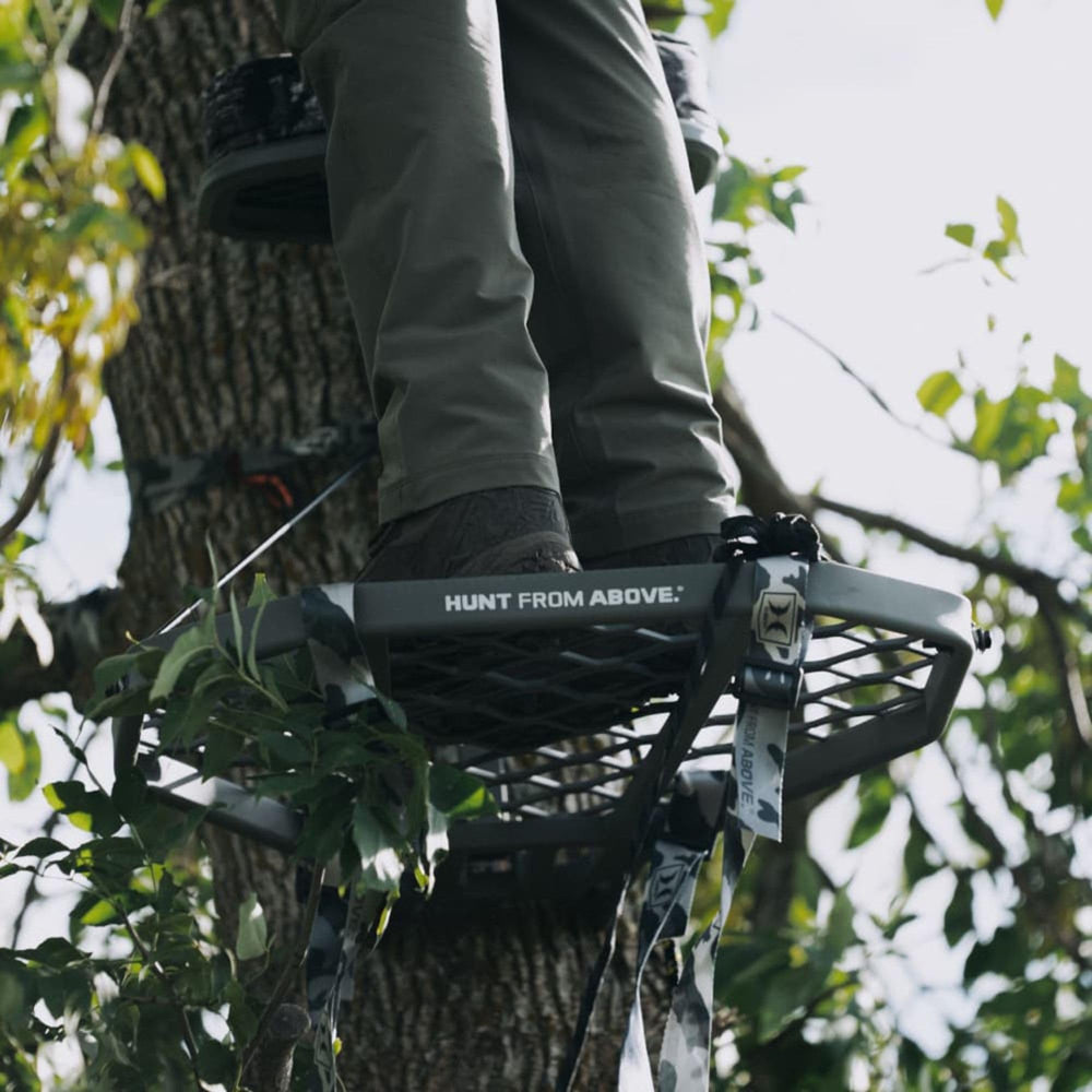 Hawk Helium XL backpack straps for hands-free carry between stands.