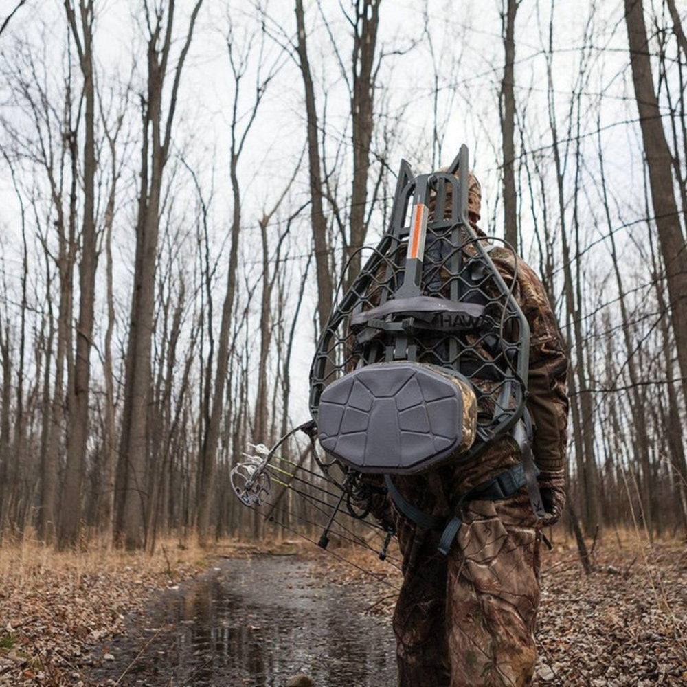 Hawk Helium XL silent-attach hooks reduce setup sound when packing.