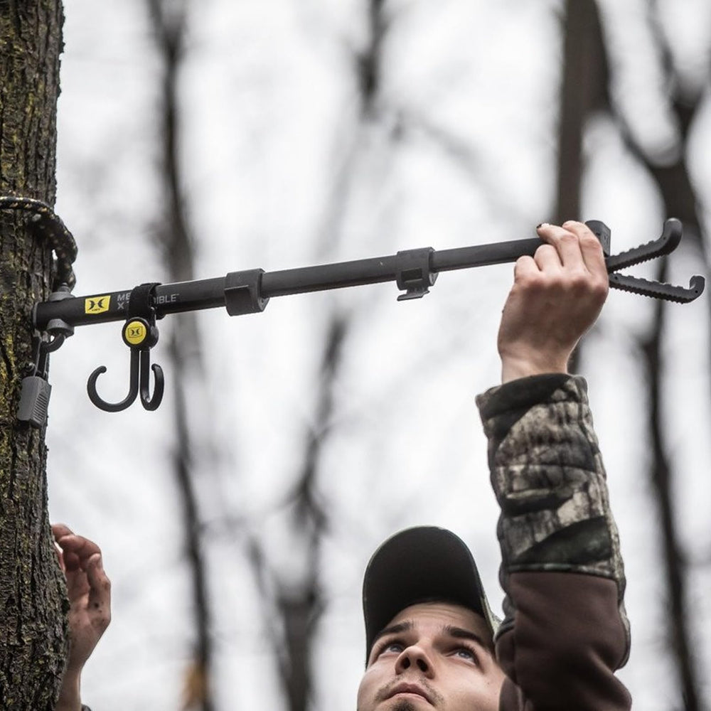 Dual silent-grip hooks on Hawk Mega Arm secure bow and gear quietly