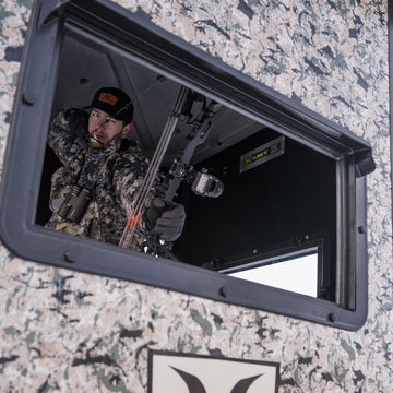 Hawk Office Box Blind large residential windows provide clear visibility for bow shooting.
