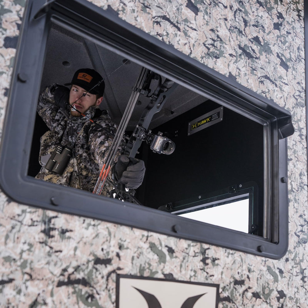 Hawk Office Box Blind large residential windows provide clear visibility for bow shooting.