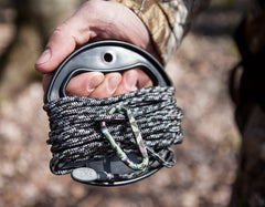 HAWK PERFORMANCE storage handle keeps lines tangle-free during hunts.
