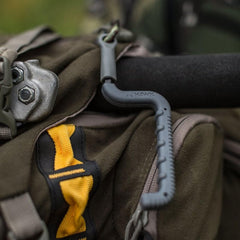 Oversized silent-grip securely holds gear without noise