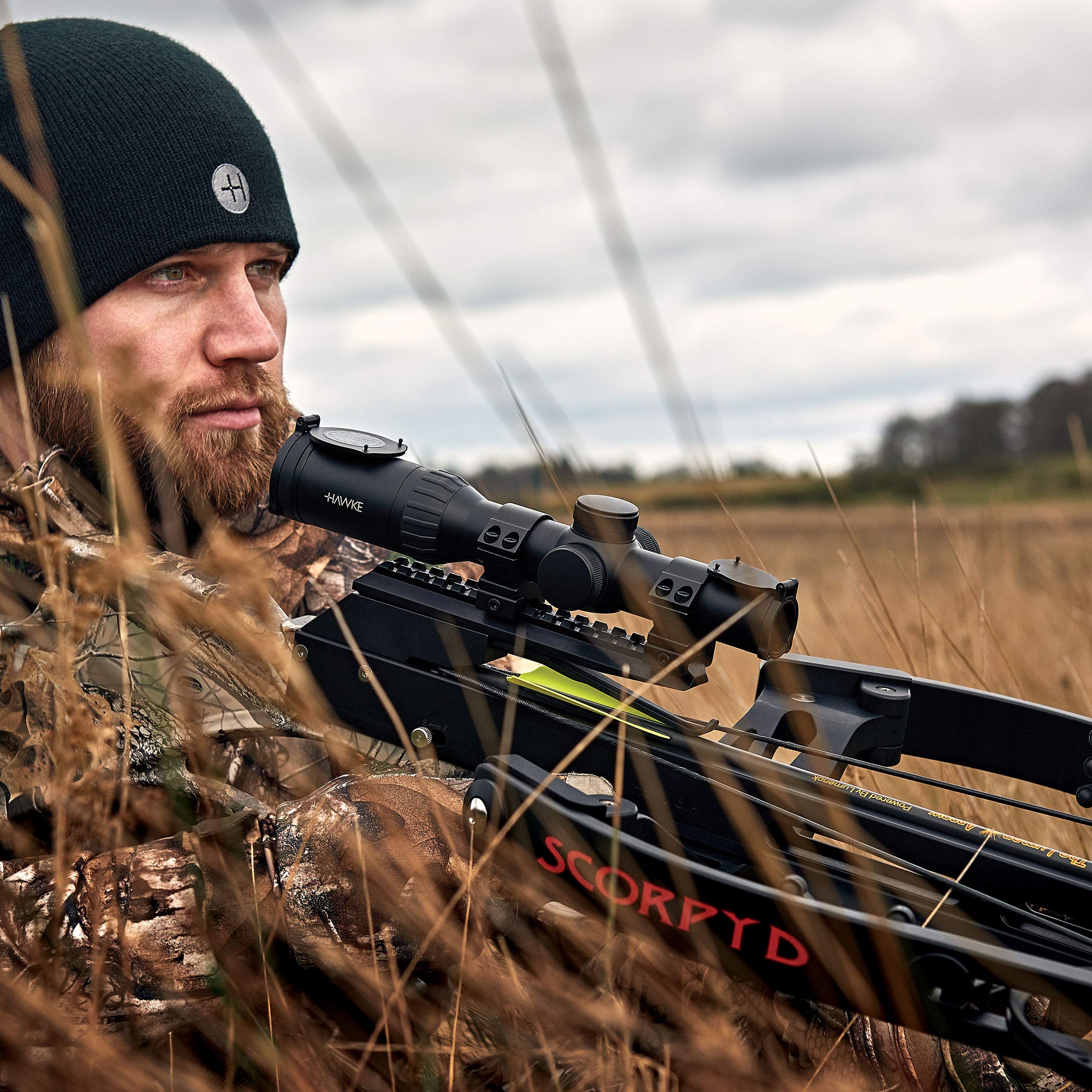 Hawke XB30 cap turrets with protective covers for quick zeroing and lens protection.