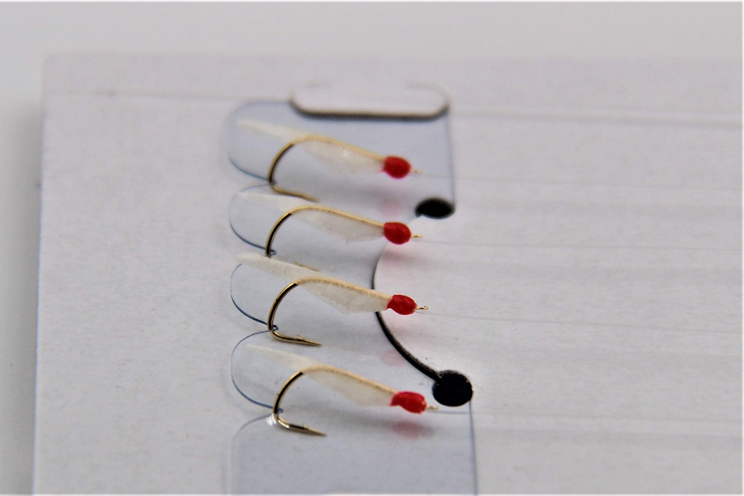 Close-up of Hayabusa Sabiki Hage hooks shows precise baiting for smaller fish.