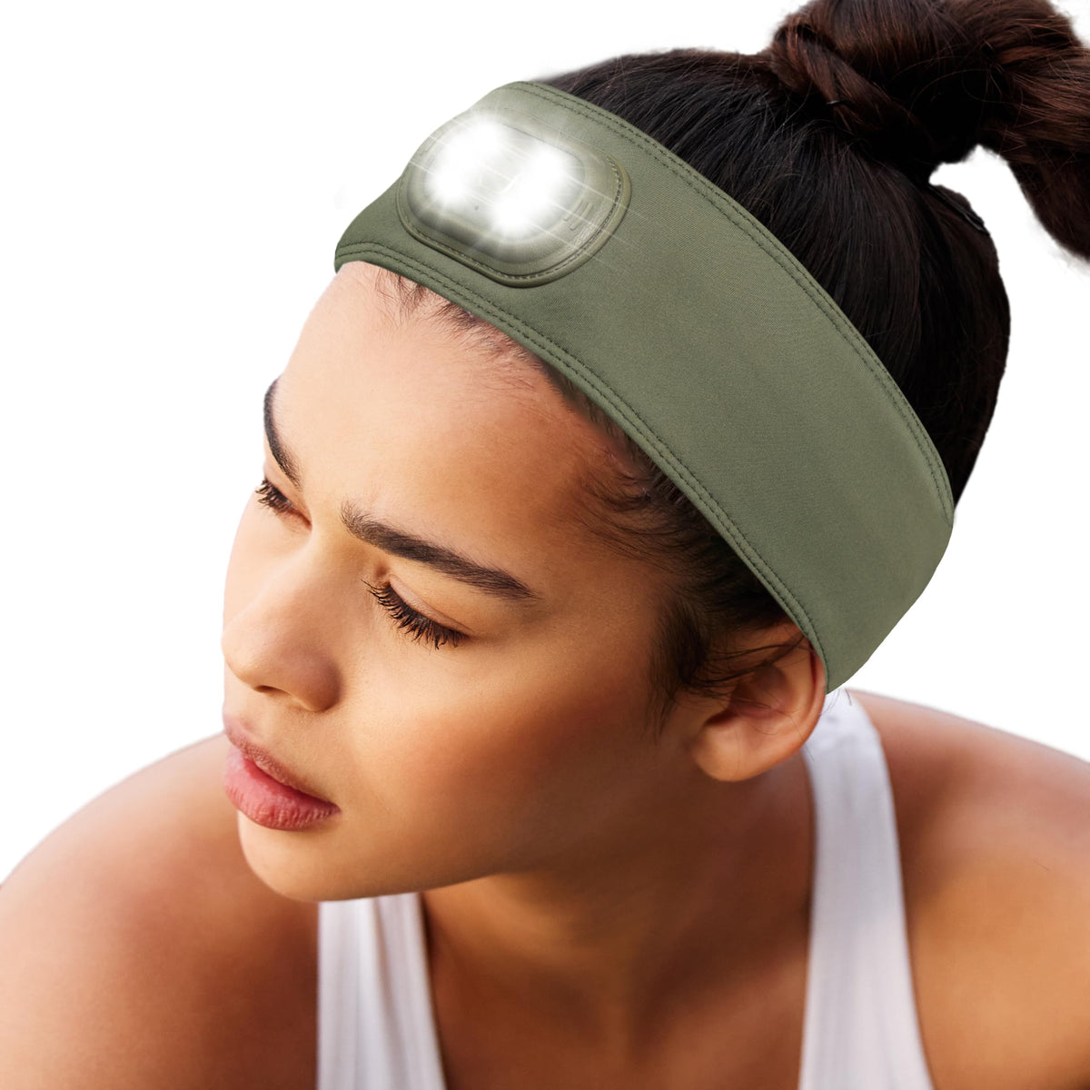 HEAD LIGHTZ headlamp on headband for hands-free visibility during runs.