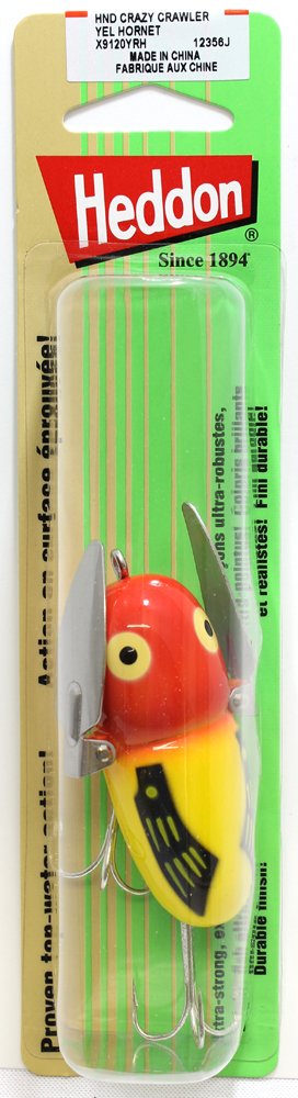 Heddon Crazy Crawler with tuned metal wings creating side-to-side cadence for strikes