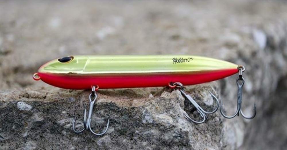 Heddon Super Spook in water action demonstrating walk-the-dog motion inviting strikes
