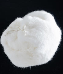 HEIZZI Ushanka ear-flaps-down demonstrates snug warmth and wind protection during commutes
