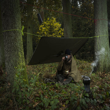 Helikon-Tex poncho shadow grey close-up texture emphasizing rugged surplus design