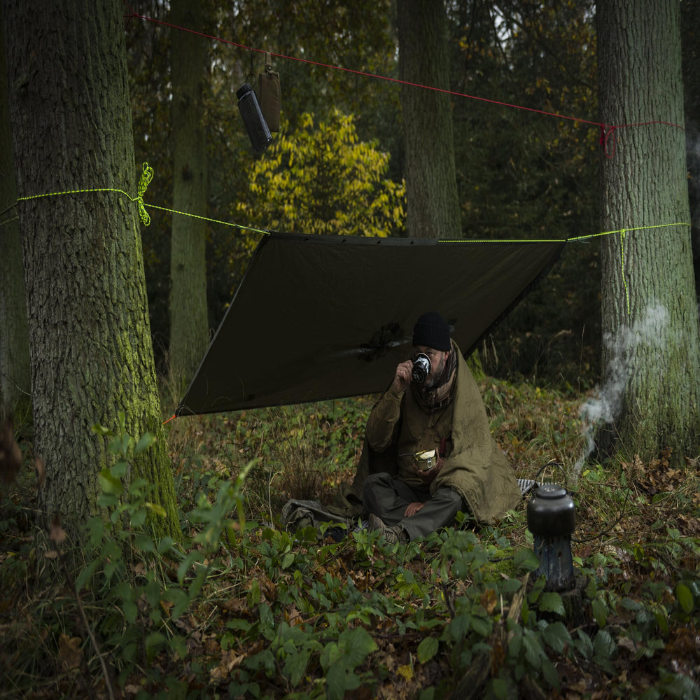 Helikon-Tex poncho shadow grey close-up texture emphasizing rugged surplus design