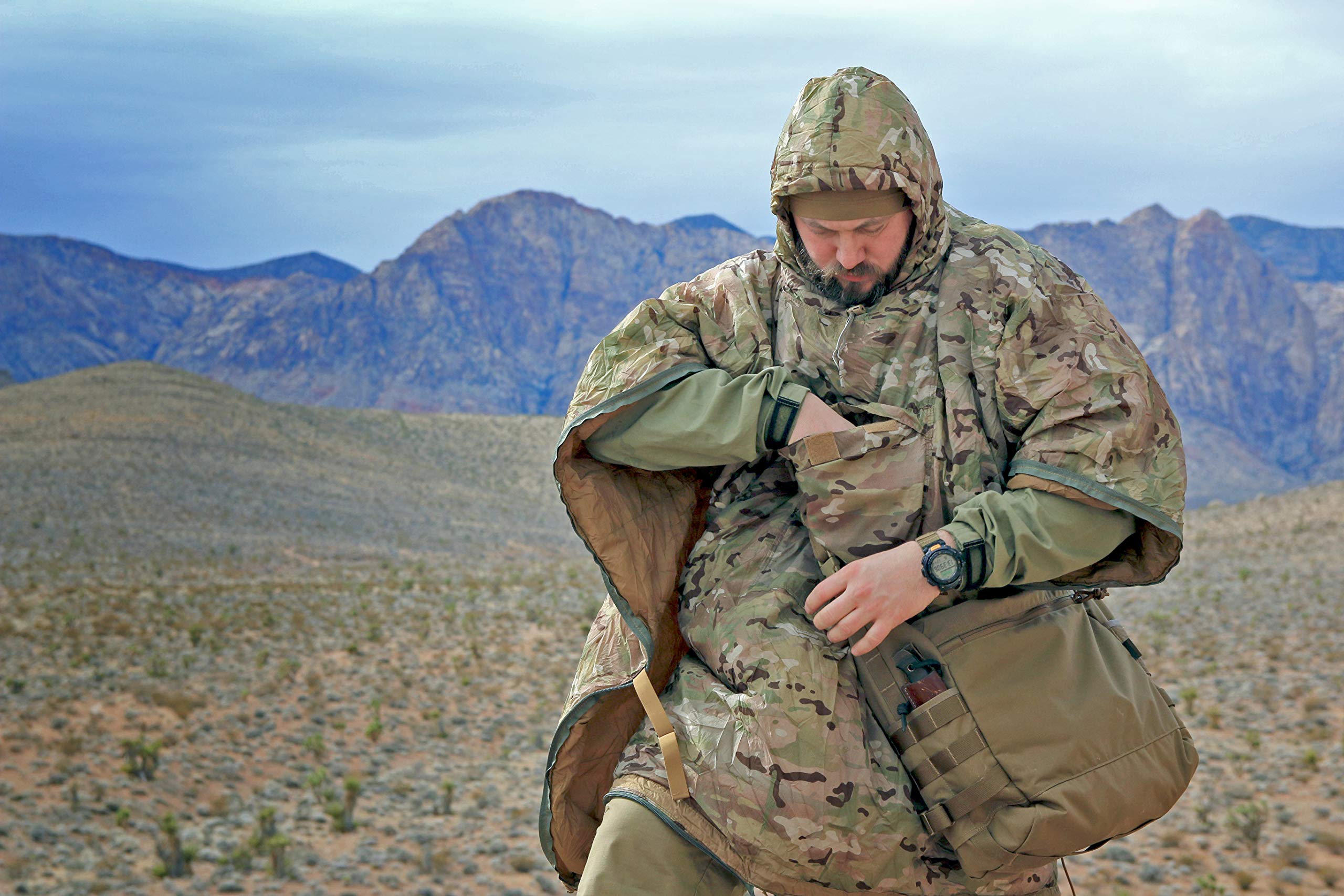 Helikon-Tex Swagman Roll Poncho Aqua Blue used as a sleeping bag for warmth on damp nights