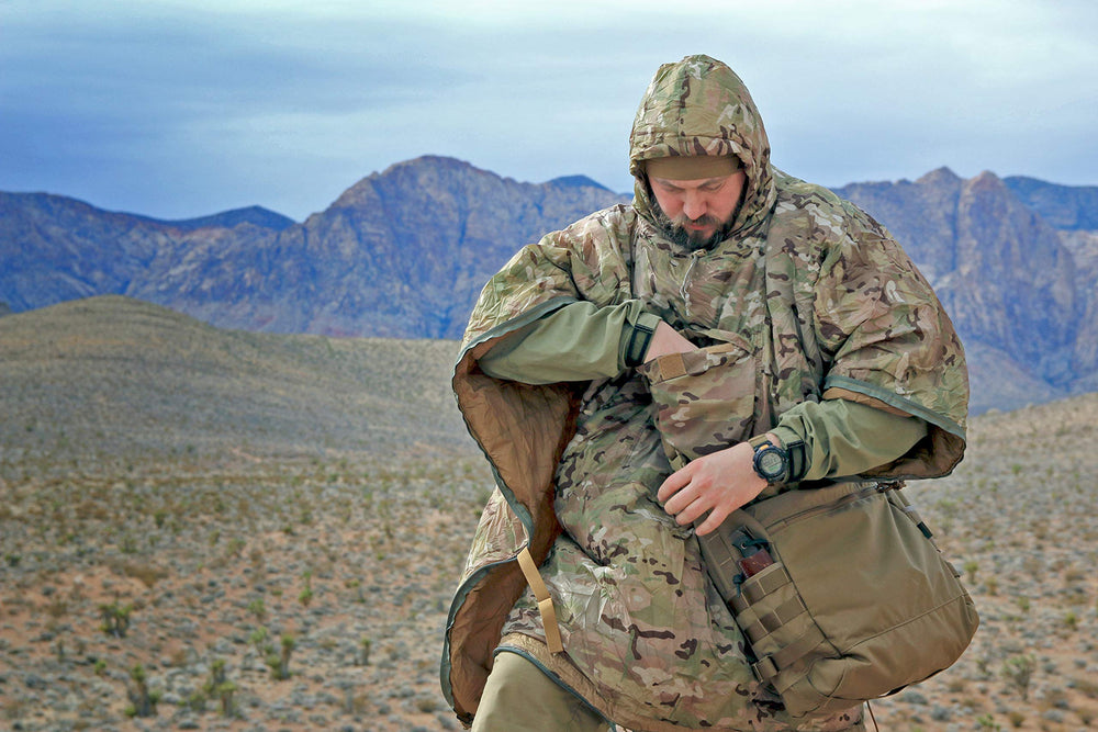 Helikon-Tex Swagman Roll Poncho Aqua Blue used as a sleeping bag for warmth on damp nights