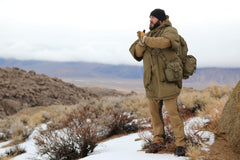 Swagman Roll poncho doubles as blanket for campsite comfort.