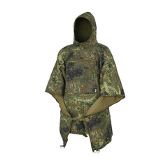 Helikon-Tex Swagman Roll poncho in Flecktarn folded for compact carry and quick shelter.