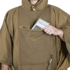 Swagman Roll poncho as hammock liner for lightweight shelter setup.