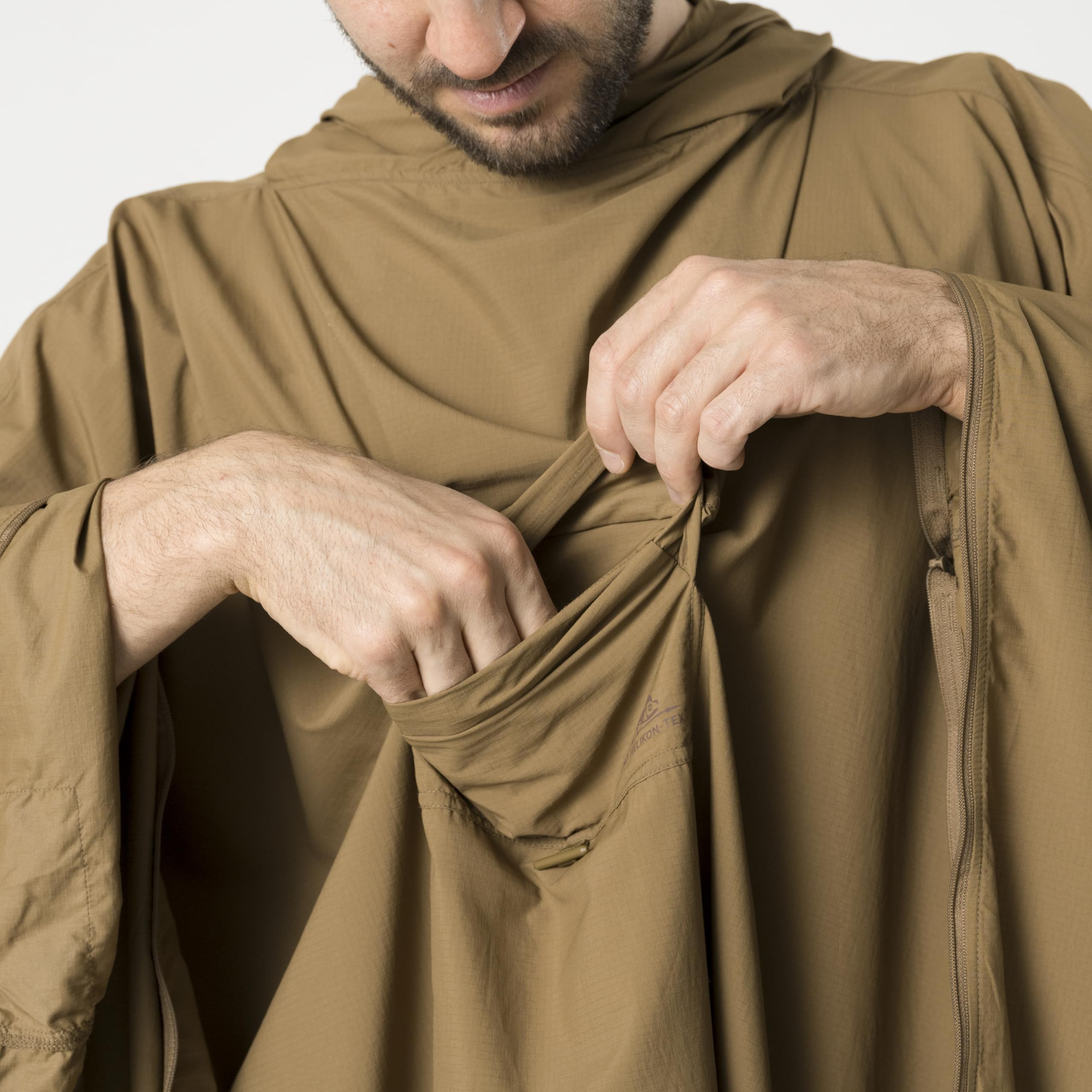 Helikon-Tex Swagman Scarf Poncho can replace foil blanket in emergencies.