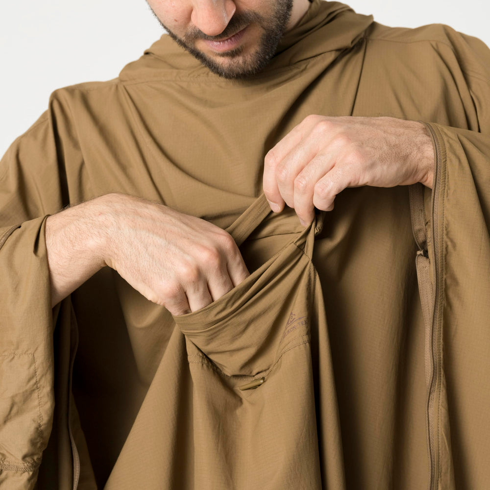 Helikon-Tex Swagman Scarf Poncho can replace foil blanket in emergencies.