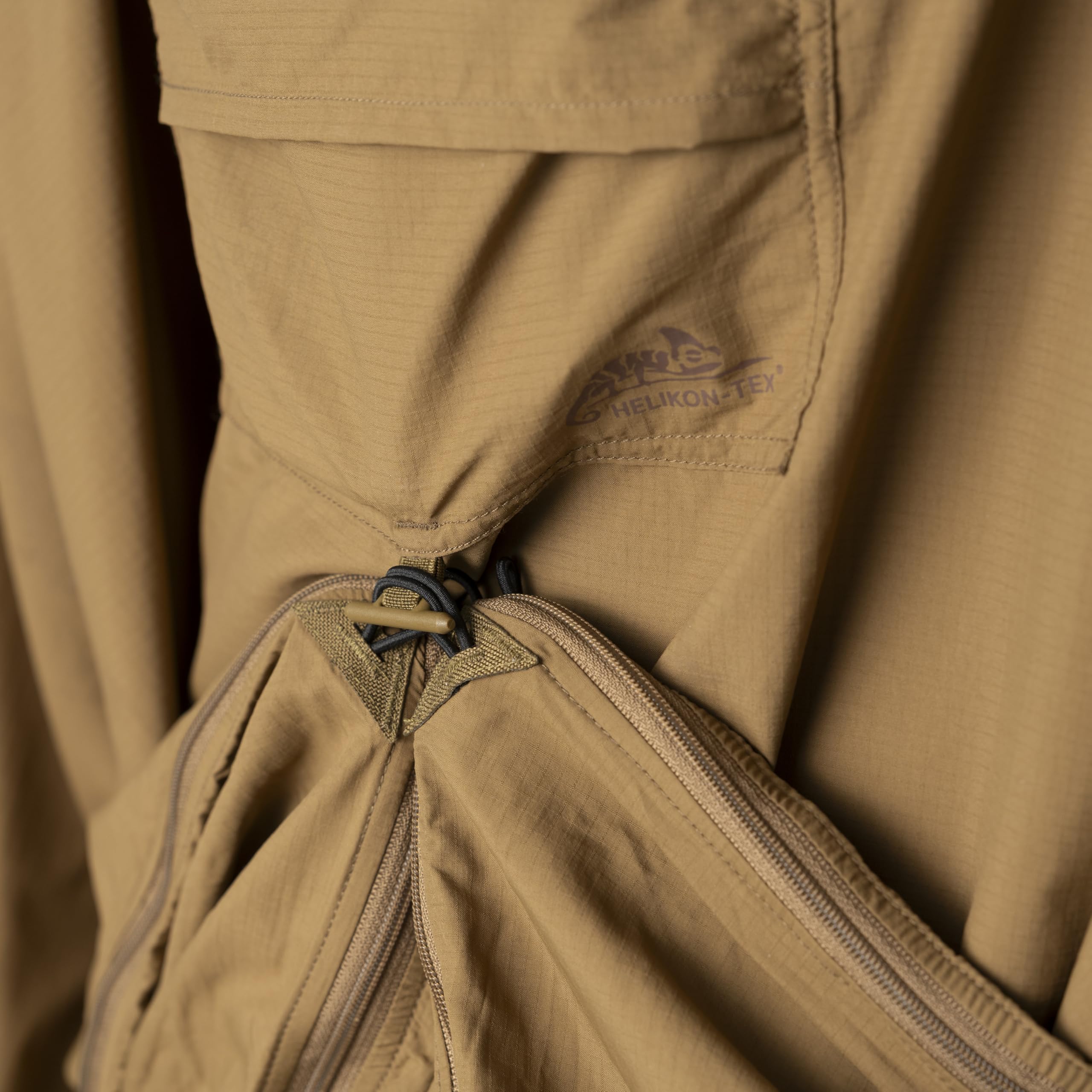 Helikon-Tex Swagman Scarf Poncho fastened at the sides as a lightweight jacket.