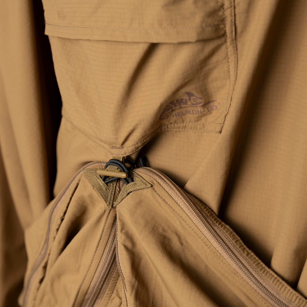 Helikon-Tex Swagman Scarf Poncho fastened at the sides as a lightweight jacket.