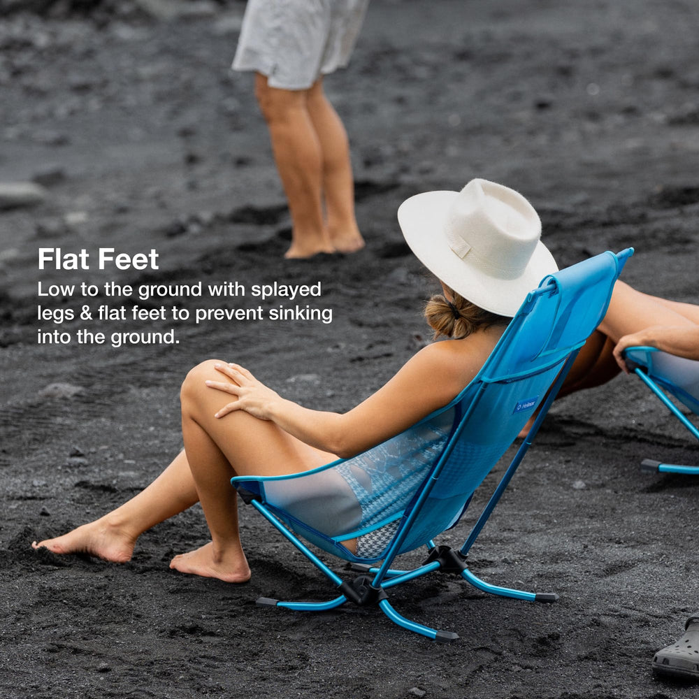 Helinox Beach Chair lightweight aluminum frame highlights portable camping gear.