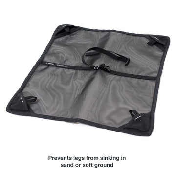 Helinox ground sheet with center strap secures chair for quick setup