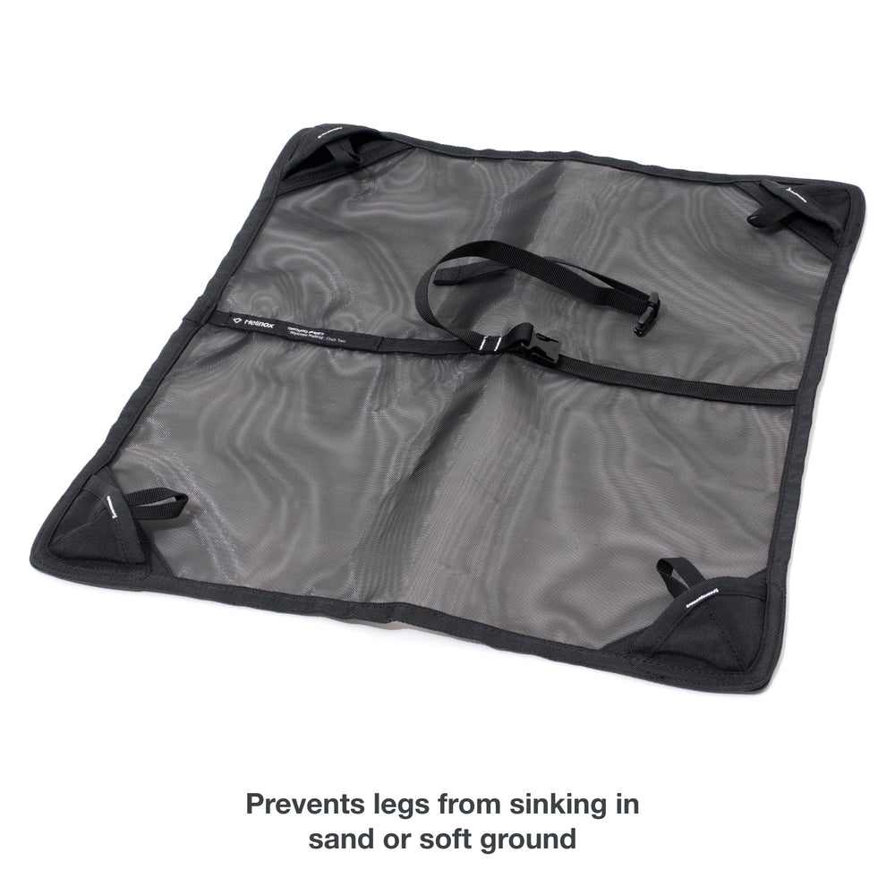 Helinox ground sheet with center strap secures chair for quick setup