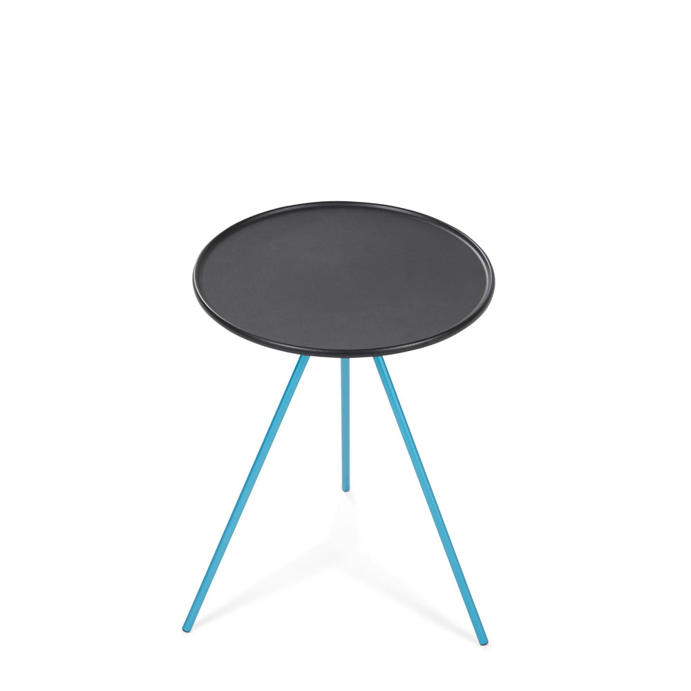 Helinox packable side table setup for camp with drinks and lanterns
