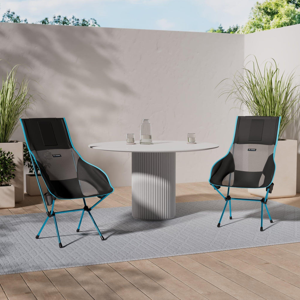 Helinox Savanna chair with ventilation mesh enhances airflow for warm-weather comfort.
