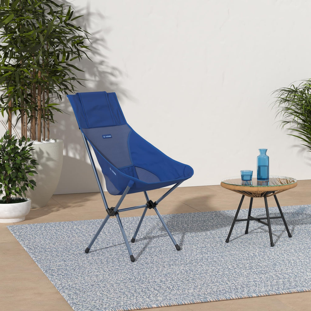 Helinox Sunset Chair high-back design highlights elevated comfort outdoors.