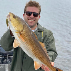 Helly Hansen H&H double-spinner lure with skirts closeup shows lifelike movement under water.