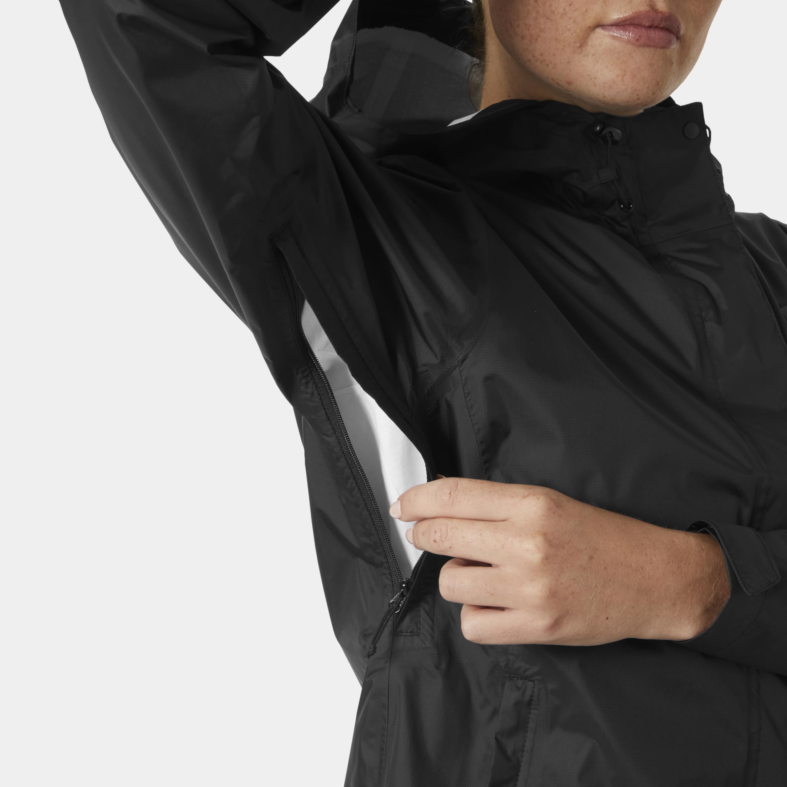 Helly-Hansen Loke Jacket Women's 2.0 worn on a rainy city commute