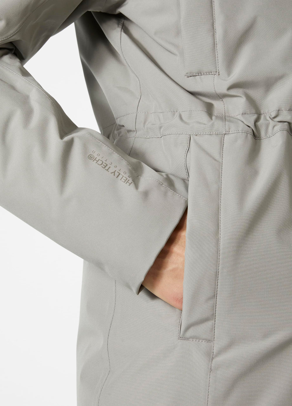 Helly Hansen Senja Parka lined hand pockets provide warmth on chilly days.