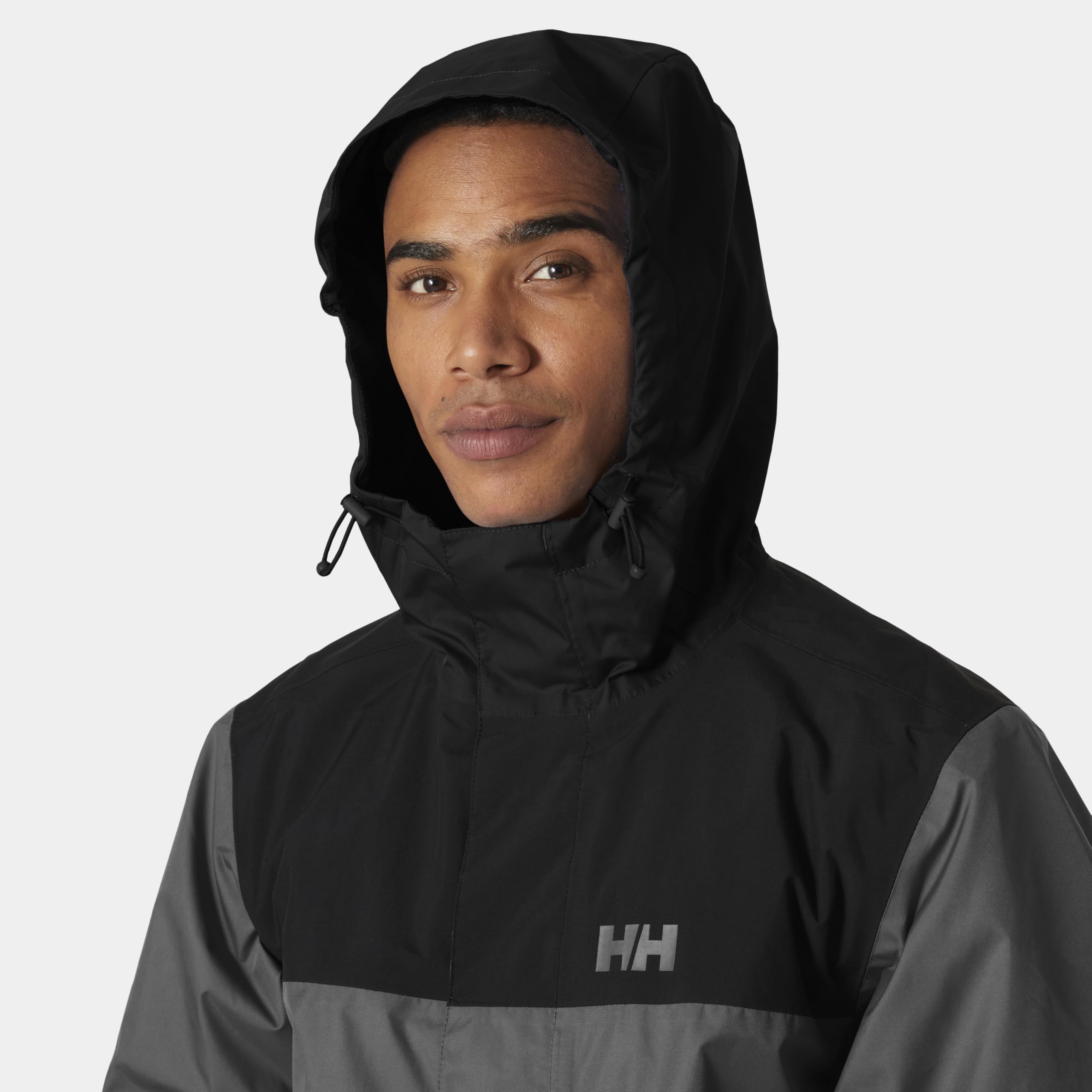 Helly Hansen Vancouver Rain Jacket adjustable hood and hem for customizable fit.