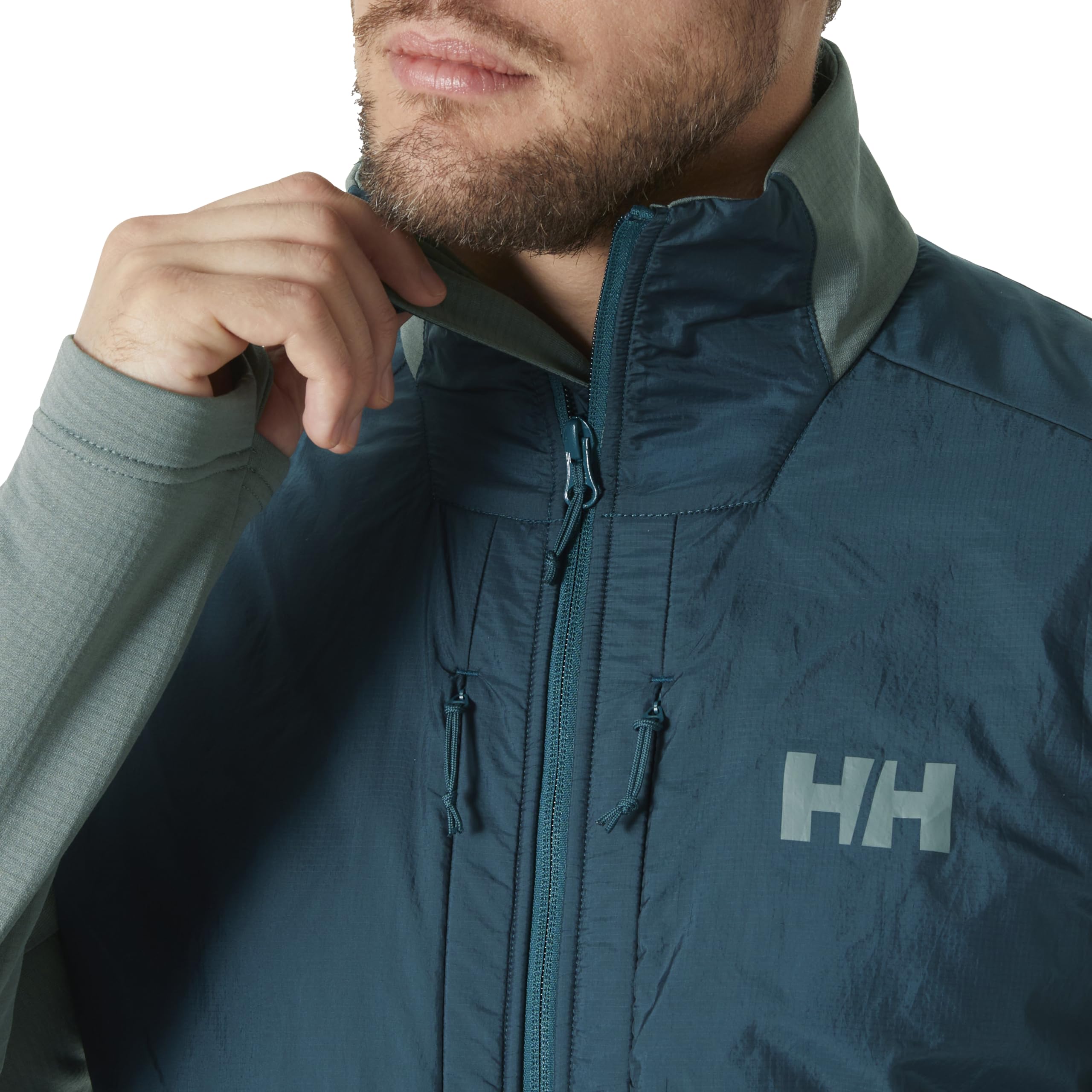 Helly-Hansen Versalite YKK zipper closeup demonstrates durable hardware for daily wear.