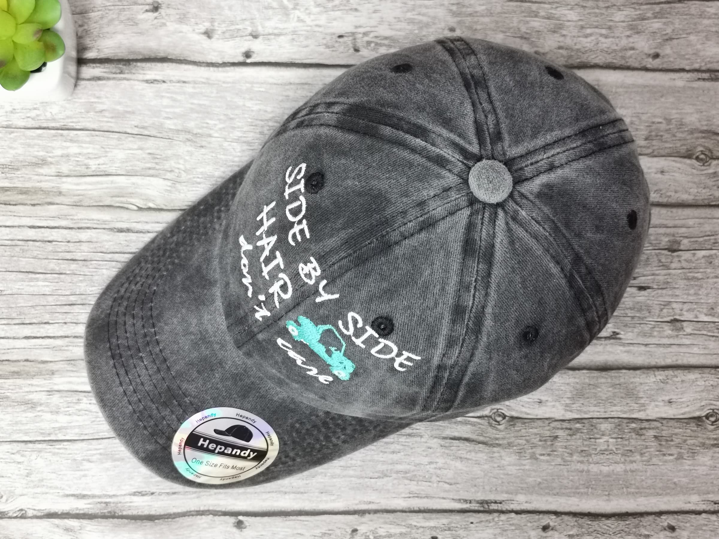 Washed black cotton twill cap with adjustable snapback