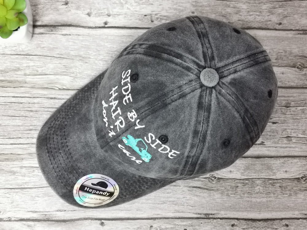 Washed black cotton twill cap with adjustable snapback