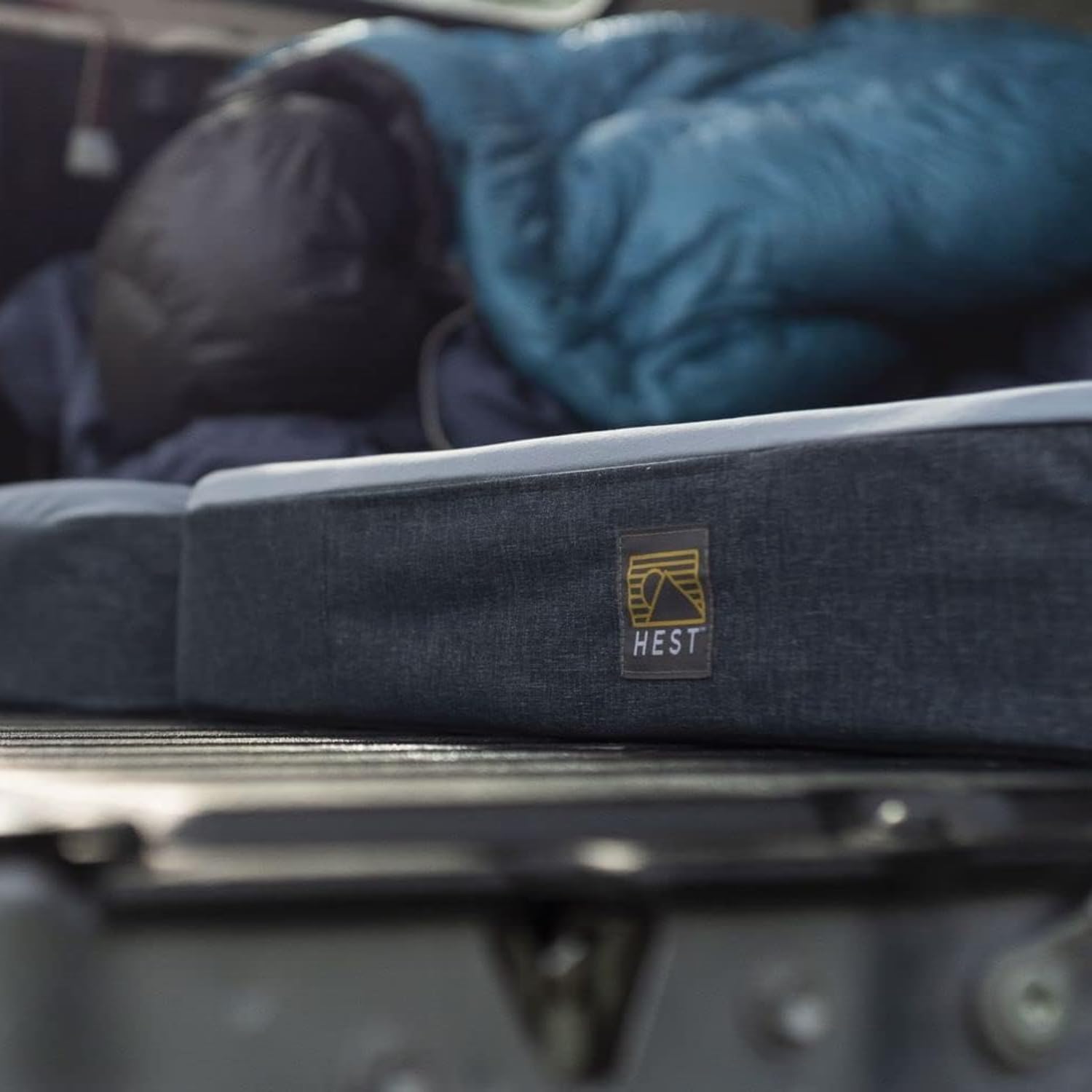 HEST Dually Short tent-scene shows flat sleeping space for family trips