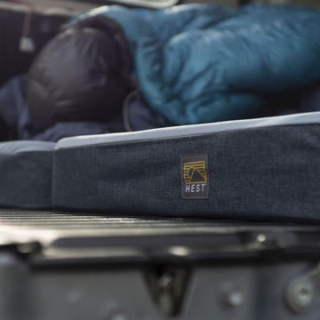 HEST Dually Short tent-scene shows flat sleeping space for family trips