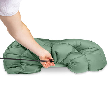 HEST packable comforter outdoor-ready setup at a campsite.