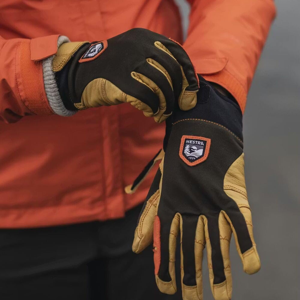 Hestra Ergo Grip Active Glove in-use during winter showcases warmth and grip.