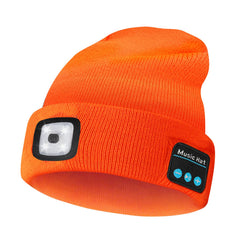 HEYAXA beanie worn during winter activity for hands-free calls and music.