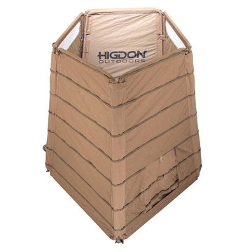 Higdon Outdoors H-Frame Panel Blind dirt setup-ready image shows fast, no-disassembly setup.