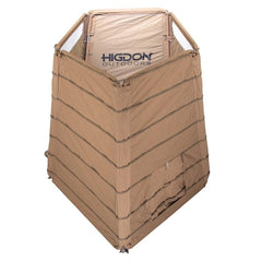 Higdon Outdoors H-Frame Panel Blind dirt setup-ready image shows fast, no-disassembly setup.
