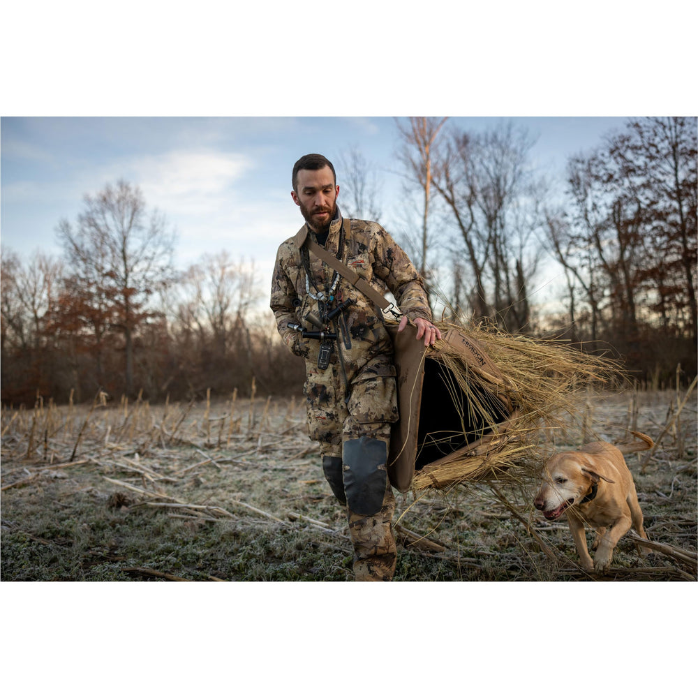 Higdon Outdoors Quick Draw Dog Blind features a padded shoulder strap for easy transport.