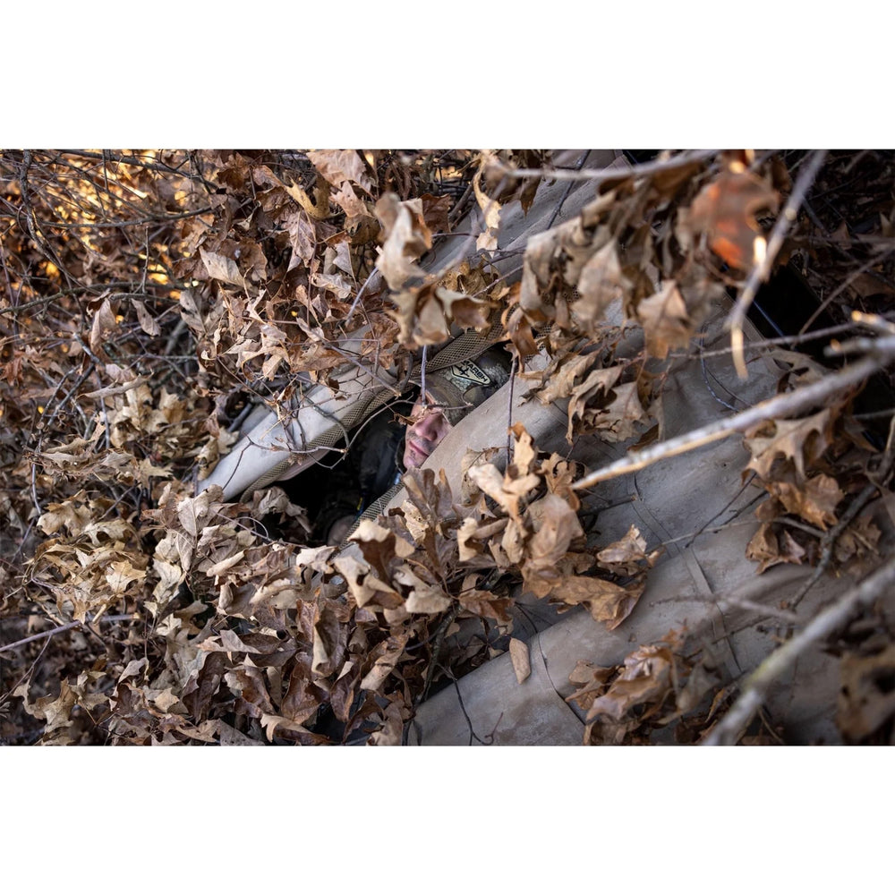 Higdon Outdoors RagTop Lid stubble-straps attach vegetation for seamless camouflage