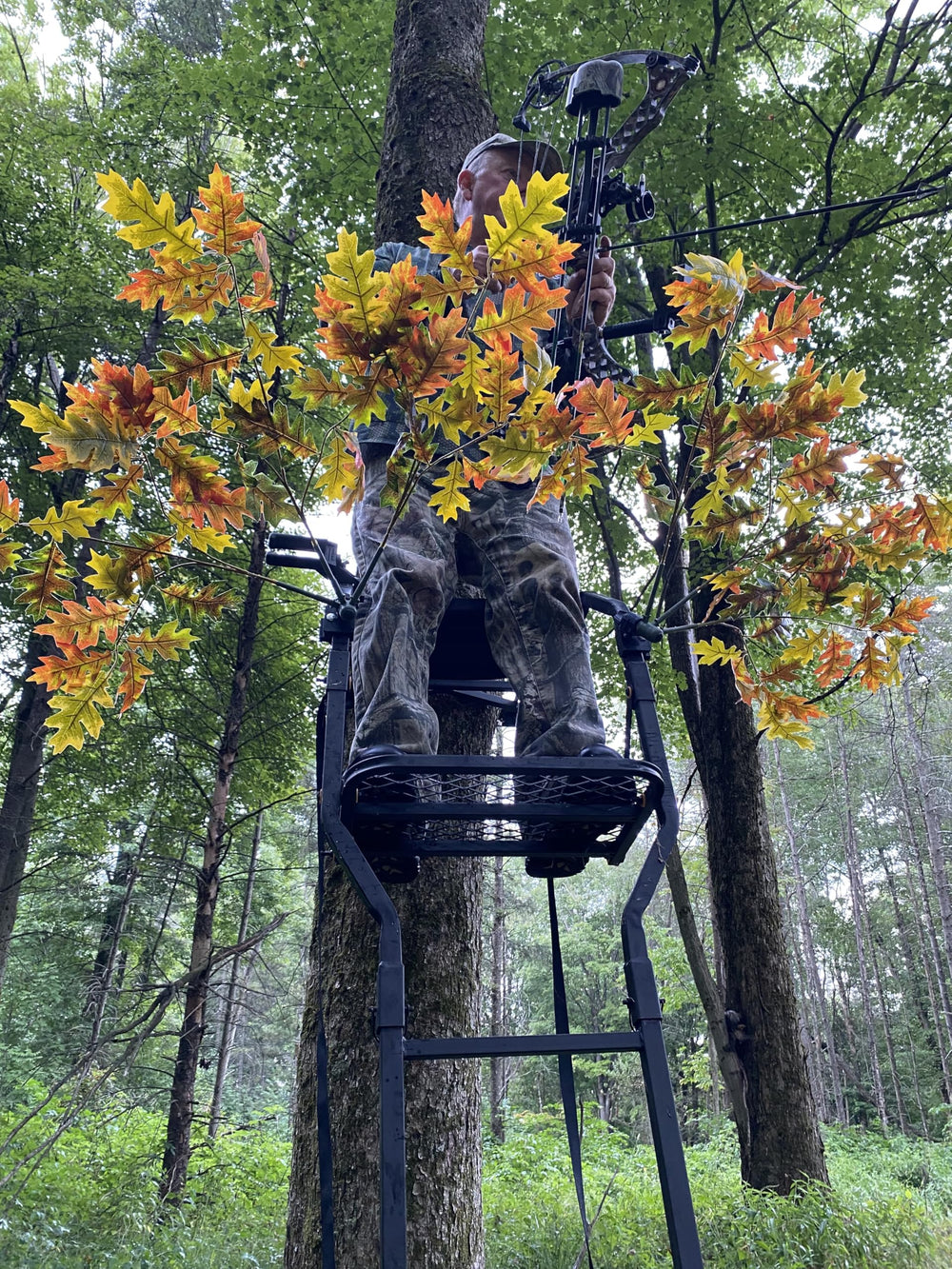 High Point Products camouflage branch with sturdy mounting bracket for secure blind attachment.